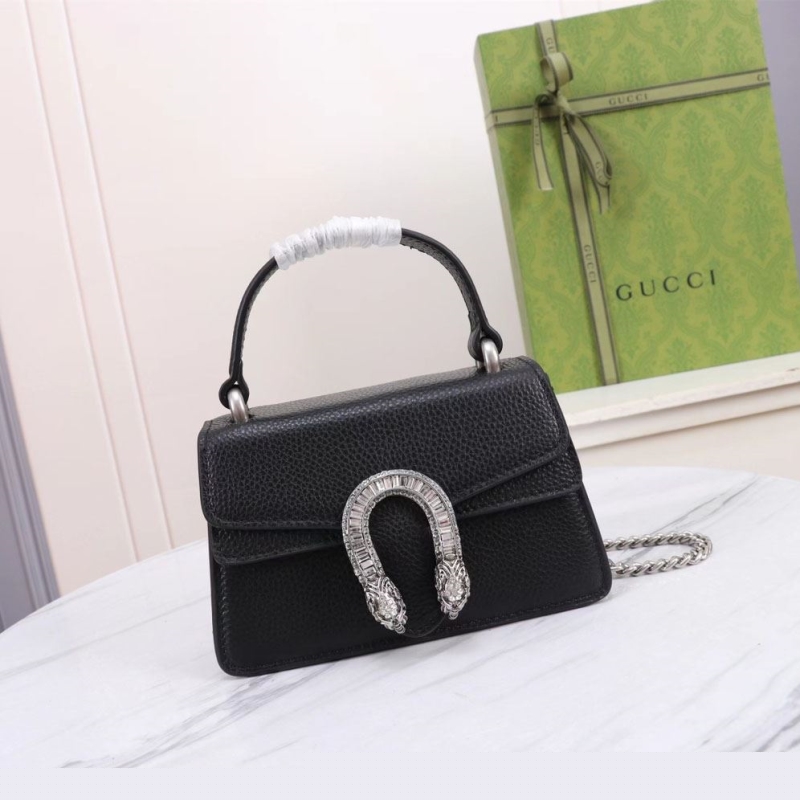 G*u*i top handle bags